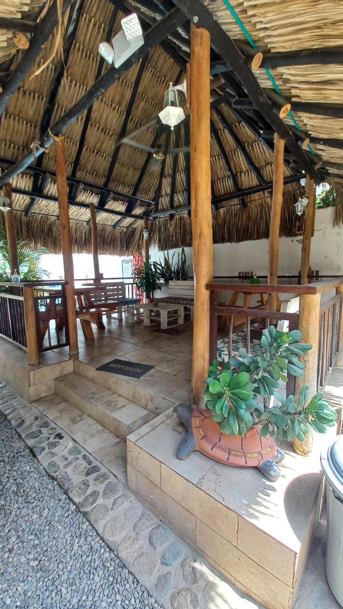 El Leon Feliz Palomino Otel Dış mekan fotoğraf